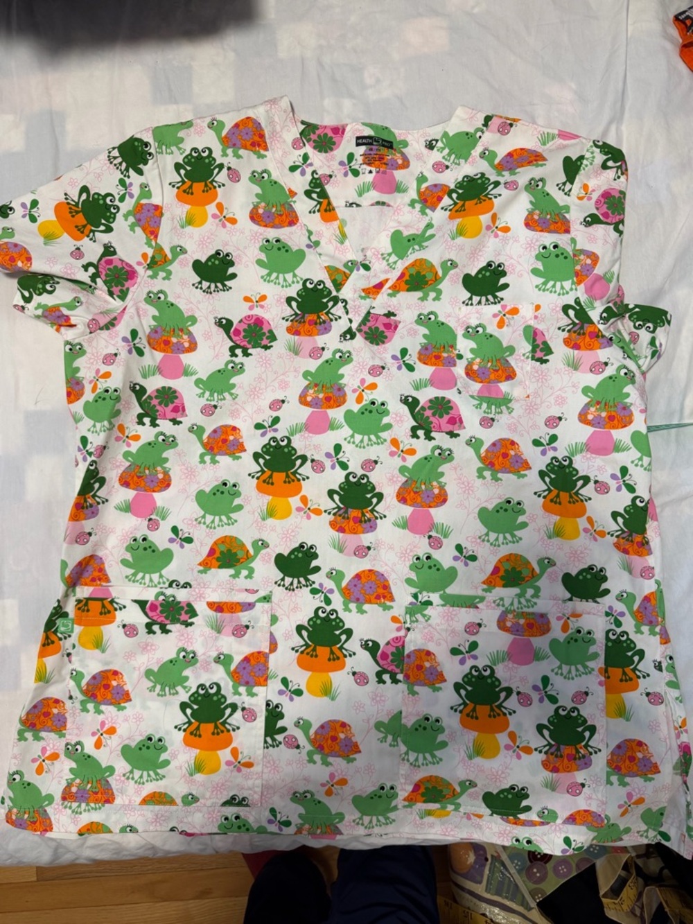 Heath Ceramics White Scrub Top with Pink, Green & Orange Frog Motif